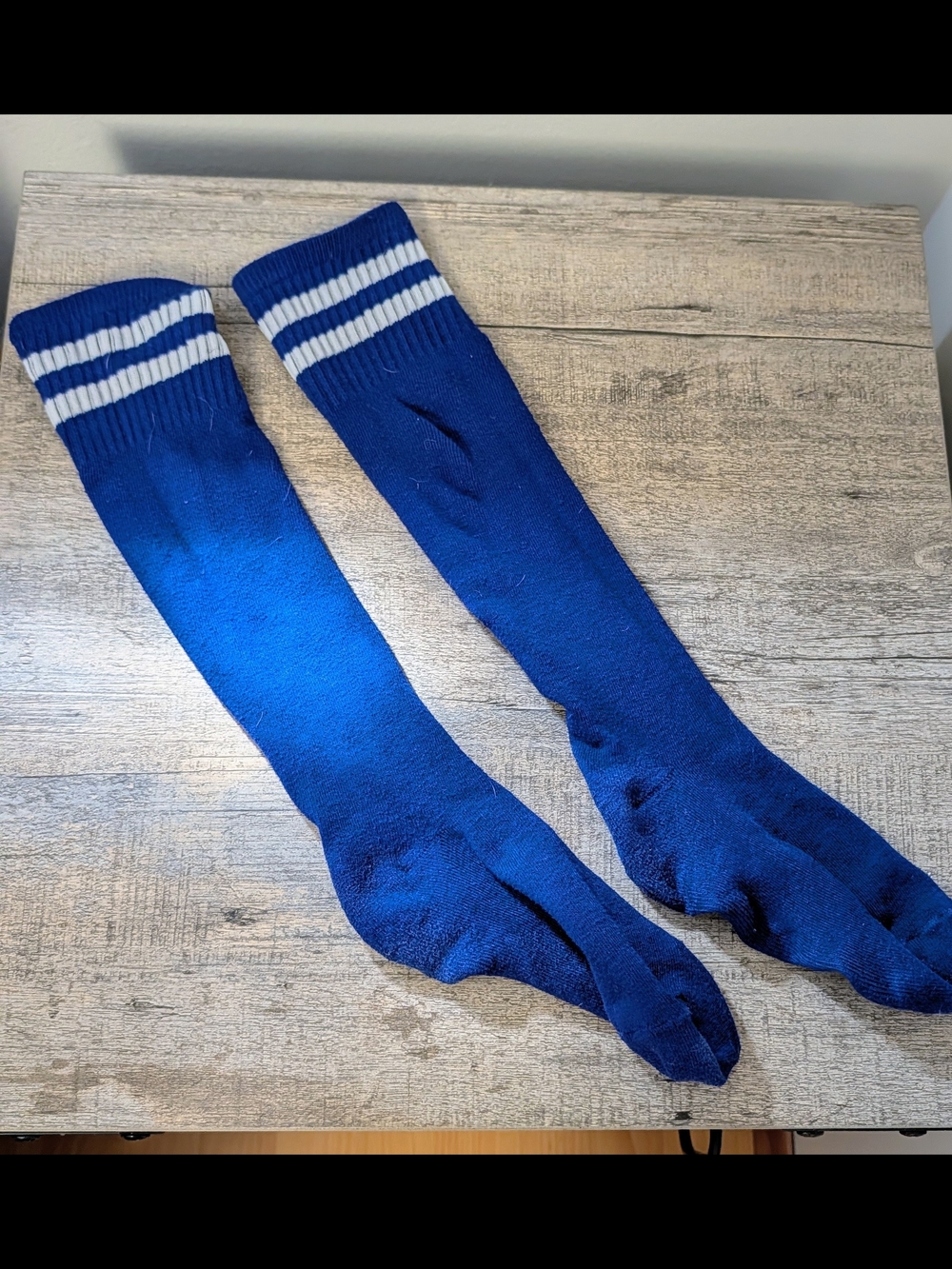 Blue Knee-High Soccer Socks with White Stripes